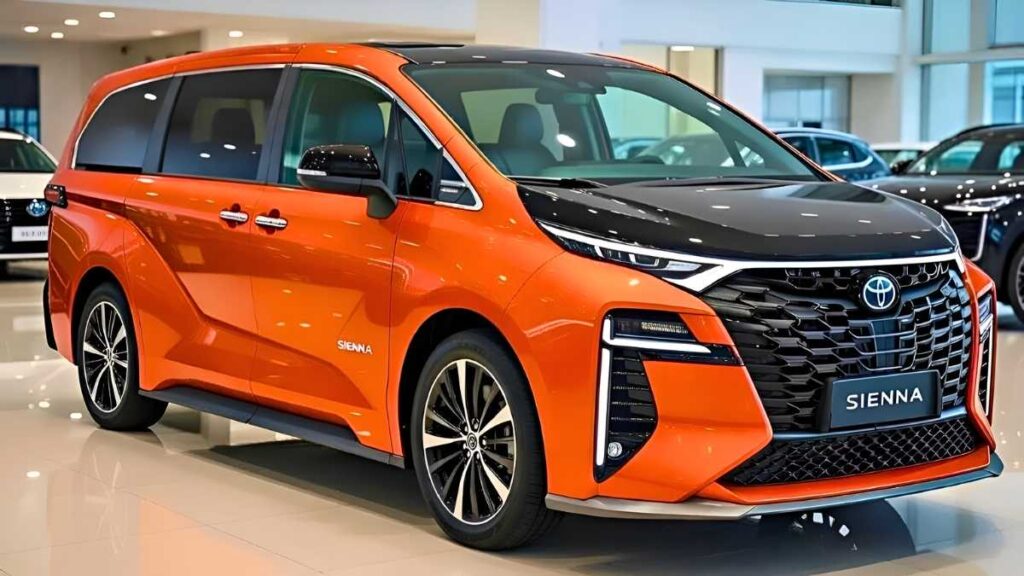 Toyota Sienna 2026 Innovación confort y estilo único en una minivan con acabado naranja y techo negro sofisticado